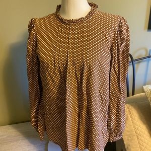Animal print blouse with ruffle and tie @ neck